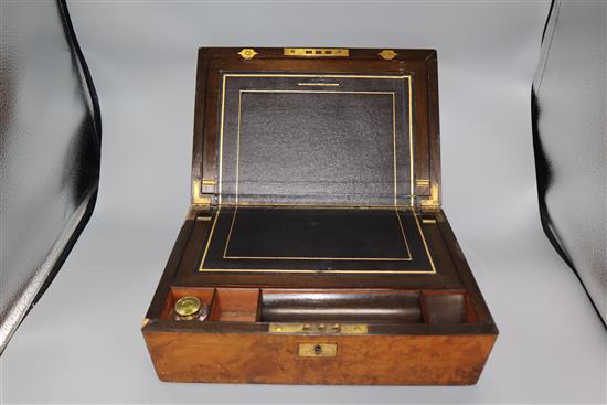 A burr walnut writing slope, with leather slope, inlaid plaque for C. Roberts